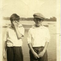 Two Boys By A Lake